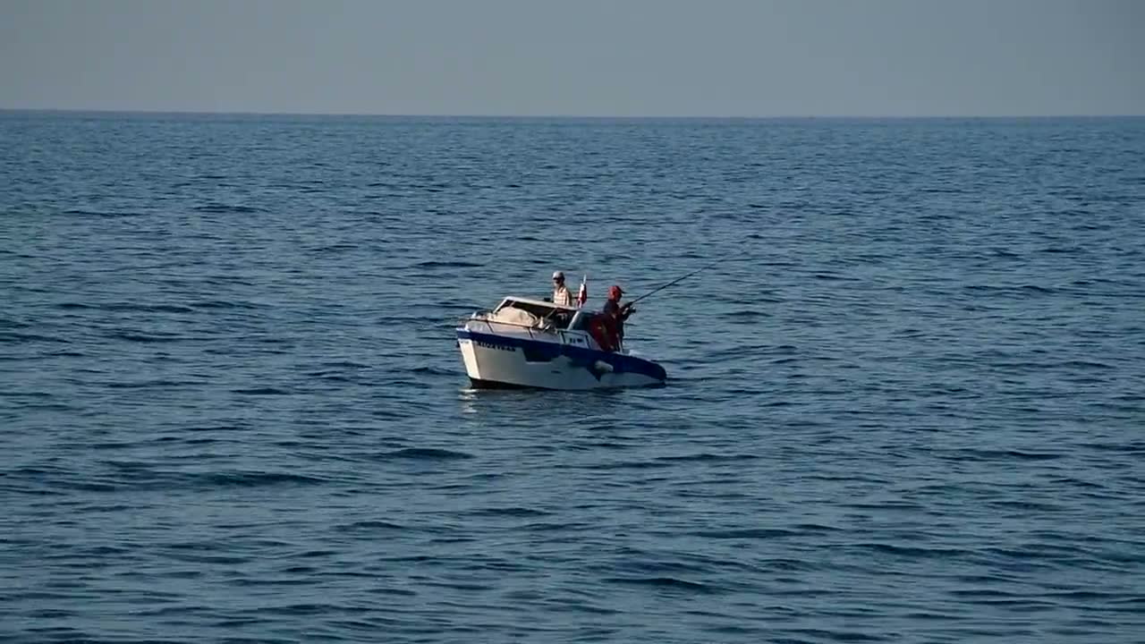 Rod bent on a sport fishing day at sea